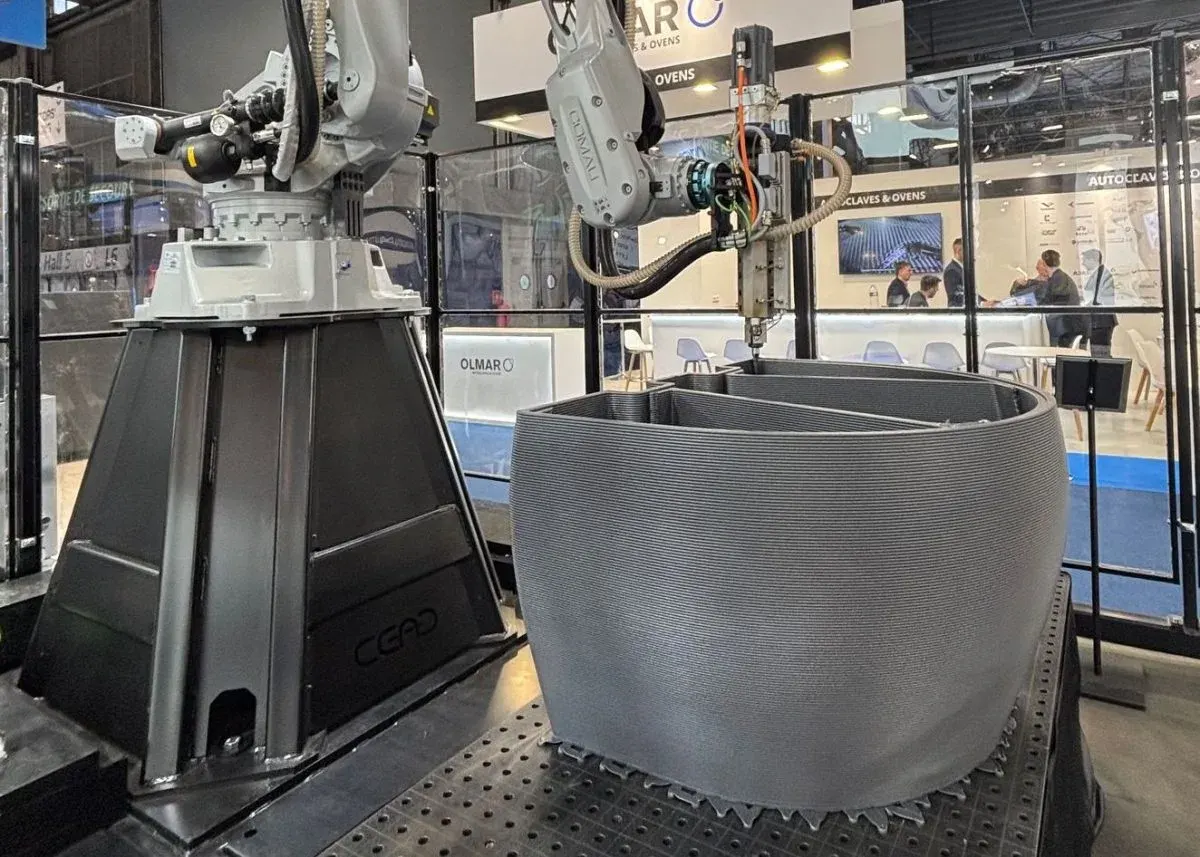 Industrial 3D printer producing metal parts for production
