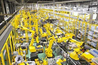 Industrial robot cell integrated into a production line